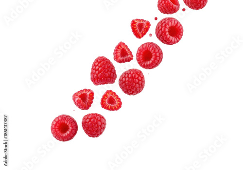 Luscious, glistening red raspberries, whole and fragmented, showing pulp and tiny seeds, floating mid-air on a transparent studio background with soft reflection. Concept of natural purity and