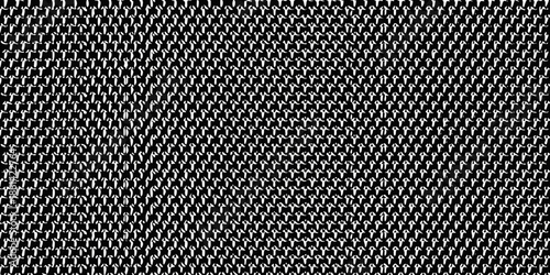 Close up of a woven mesh textile with a repeating geometric pattern