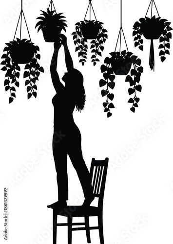 Woman tending to hanging plants from chair