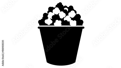 Black silhouette of popcorn bucket filled to brim with popcorn, isolated vector graphic for snacks and events, versatile background option
