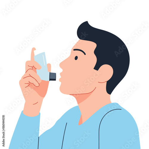 Young man using inhaler for breathing assistance indoors  
