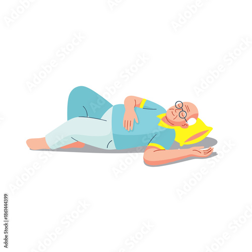 Elderly man lying comfortably on the floor with a pillow  