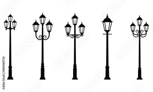 Set of black silhouettes showing various vintage street lamps