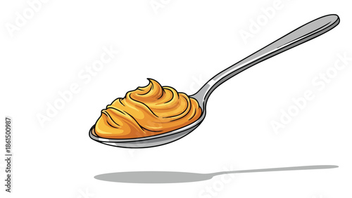A spoonful of creamy, delicious golden spread, ready to enjoy