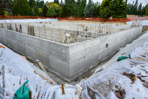 Fotografi Large Stormwater Retention Tank project under construction, foundation dug and c
