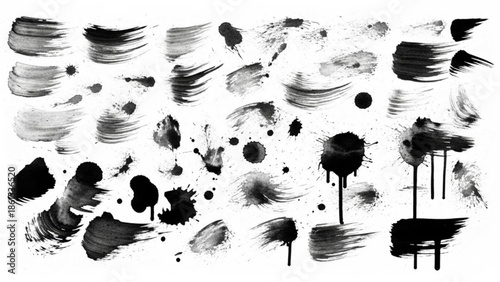 Collection of black paint brush strokes and splatters for artistic design