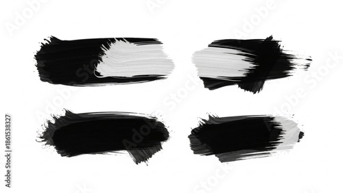 Four black and white brush strokes on a pure for design