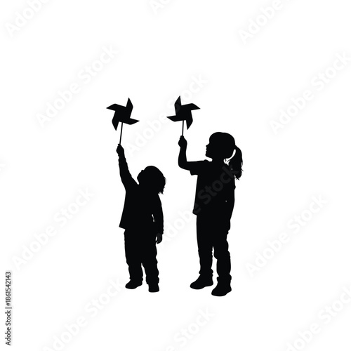 Two children playing with pinwheels in joyful outdoor moment