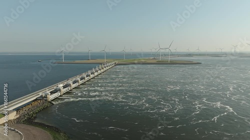 Wallpaper Mural Coast with bridge and floodgate, wind engines with the north sea, Netherlands. Aerial drone video Torontodigital.ca
