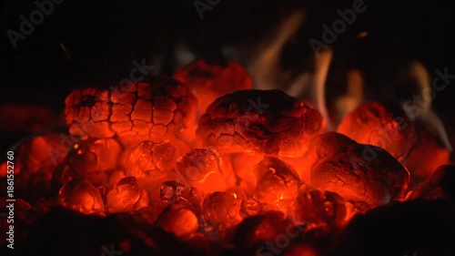Glowing embers in darkness