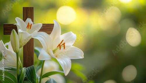 Wooden cross, easter lilies on green blurred background. Christian holiday floral composition with religious symbol of faith, hope, love