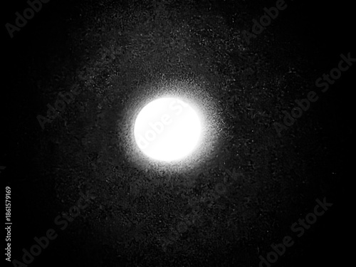 Cluttered, unfinished room with building materials, debris, a pallet, pipes, and buckets. Rough, raw construction or storage space.