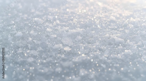 A serene close-up view of snowflakes gently falling on a winter landscape