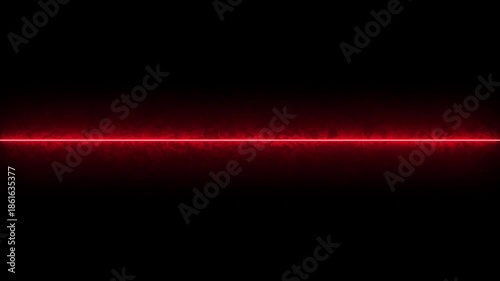 Red laser beam with smoke effect on black background technology abstract