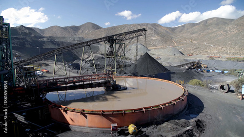 Photos Mineral processing plant with conveyor belts and mineral thickening tanks