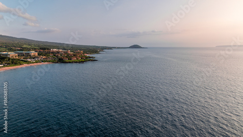 Photography Panoramic aerial view of oceanfront resorts, vacation homes, and Makena State Pa