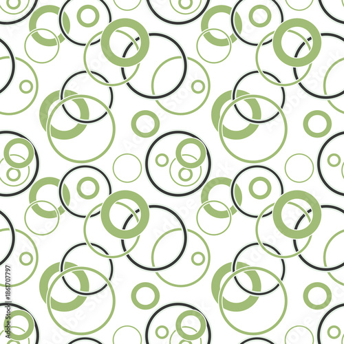 green and black rings and circles on white