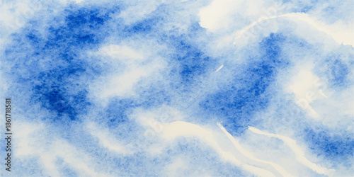 A beautiful clear blue sky background featuring fluffy white clouds in the bright summer sunlight for a stunning nature cloudscape view of the high atmosphere on a sunny day