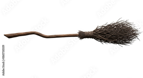 An ancient witch's broomstick with a dark mahogany handle floating horizontally on a white studio background with copy space. Concept of halloween magic