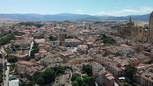 Wallpaper Mural Aerial View of Historic Segovia Skyline Spain

Drone shot of medieval rooftops, stone streets, and the central church tower of Segovia filmed in 2025.
 Torontodigital.ca