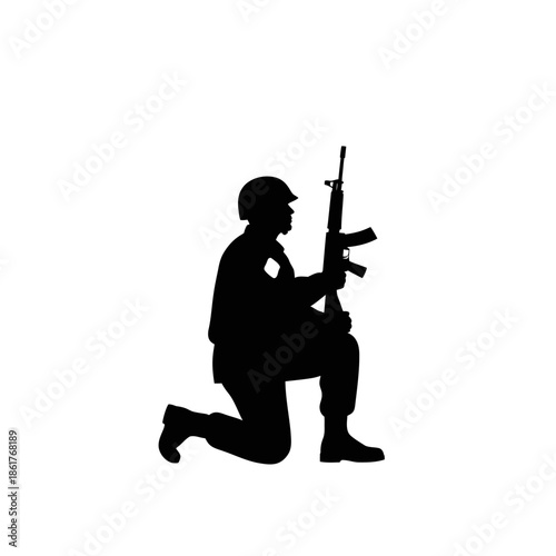 Silhouette of a kneeling soldier holding a rifle, military, army, combat, war