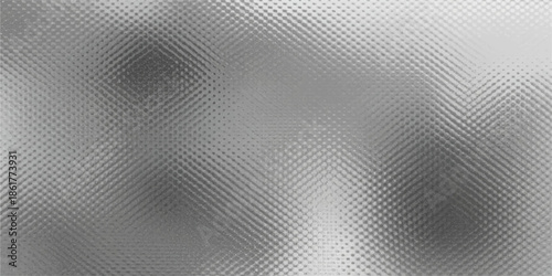 Dark industrial wallpaper featuring a brushed steel metal texture with a gray metallic surface and carbon fiber grid pattern for a sleek chrome material backdrop