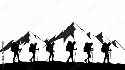 Silhouettes of hikers walking across a mountain range.