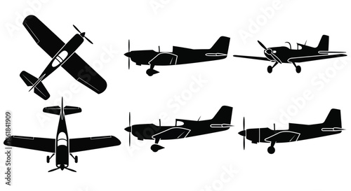 A collection of black airplane silhouettes in various flying positions