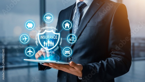 Business professional using tablet with insurance icons and shield overlay