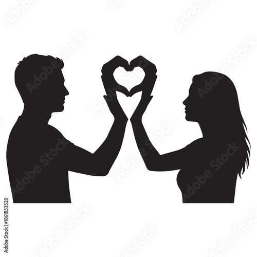 Loving couple forming heart shape with hands in silhouette