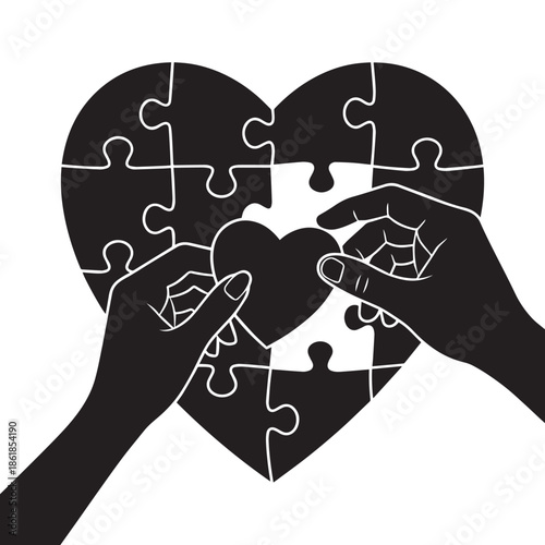 Hands completing heart shaped puzzle pieces
