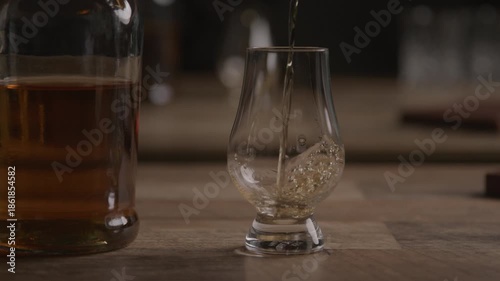 Bourbon being poured in a glass