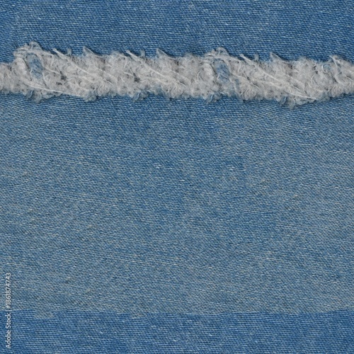 Seamless  Ripped blue hipster jeans material. Destroyed denim Cloth texture. Close up.