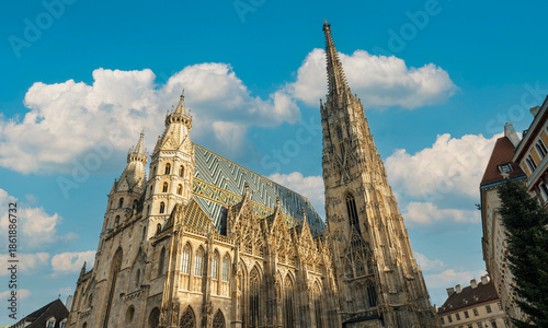 Beautiful St. Stephen's Cathedral features a stunning Gothic facade and a vibrant roof of 230,000 colorful tiles depicting the imperial double-headed eagle.