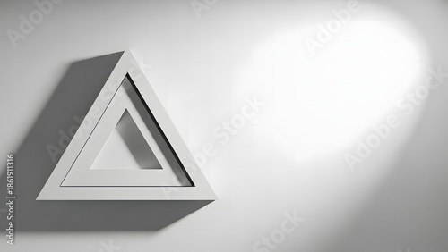 A minimalist composition featuring a white triangular prism casting a dramatic shadow illuminated by a soft light source