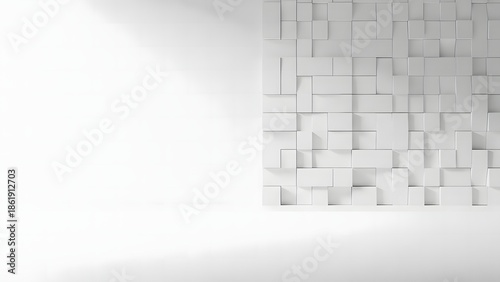 A minimalist white wall features a textured three dimensional cubic pattern illuminated by soft diffused lighting
