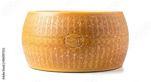 Large wheel of aged parmesan cheese isolated on white background