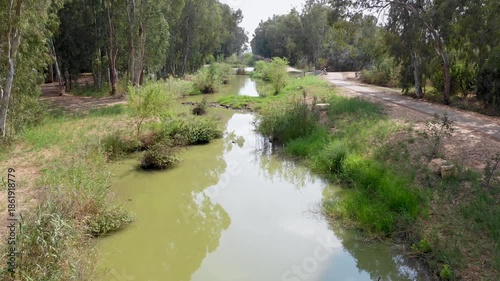 Aerial view of Naaman stream on a sunny day in northern Israel