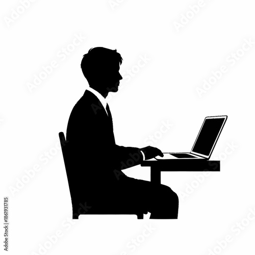Man Working on Laptop at Desk.