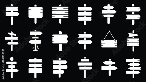 Collection of various wooden signboards with arrows and pointers .