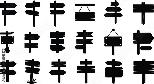 collection of wooden signposts with multiple pointers .