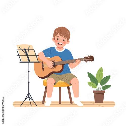 Joyful young boy playing acoustic guitar in a cozy home setting with a potted plant and music stand