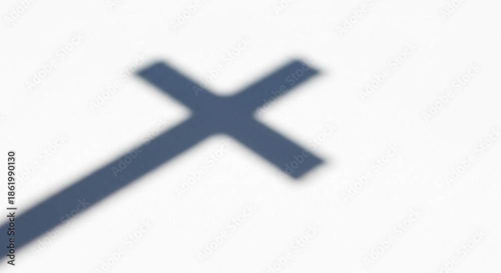 Obraz premium Minimalist religious background with a soft cross shadow for Easter design
