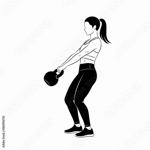 Woman preparing for kettlebell swing exercise in gym setting