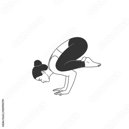 Silhouette of practitioner performing yoga crow pose arm balance