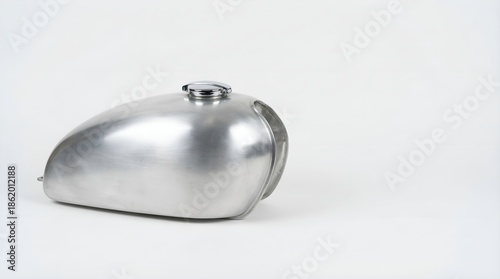 Shiny metal motorcycle fuel tank closeup