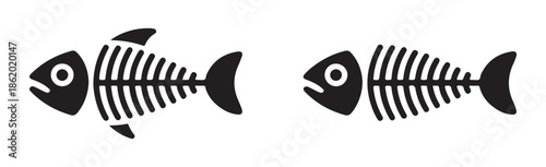 Two variations of filled black fish bone icons showcasing aquatic animal remains with distinct head and tail shapes