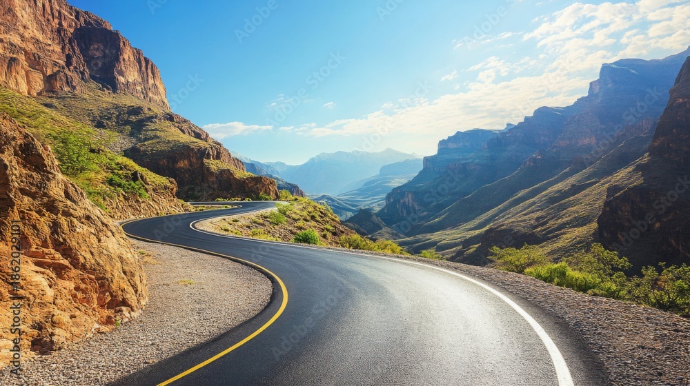 Fototapeta premium Winding Road Through Majestic Mountain Canyon