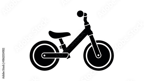 Balance Bike Silhouette: A sleek, minimalist representation of a balance bike, ideal for illustrating concepts related to childhood, mobility, and outdoor play.