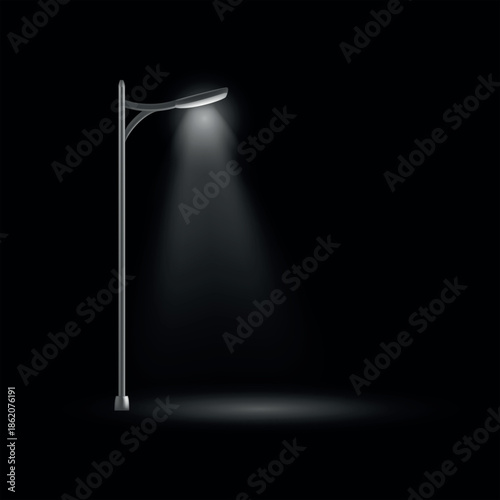 A night road lit by streetlights